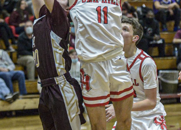 Oak Hill’s Trey Foster pulls down a rebound against GW during Friday action in Oak Hill. *F. Brian Ferguson/Lootpress)