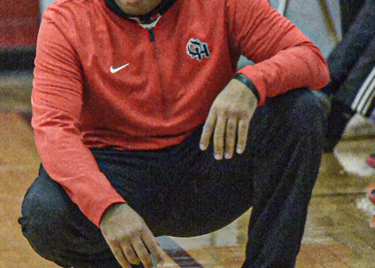 Oak Hill head coach Benitez Jackson watches Friday’s action against GW. (F. Brian Ferguson/Lootpress)