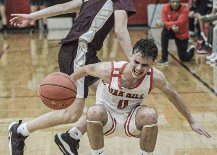 Oak Hill’s Jacob Perdue is fouled during Friday action in Oak Hill. (F. Brian Ferguson/Lootpress)