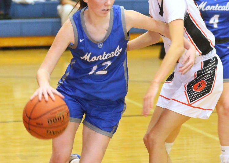 (Brad Davis/For The LootPress) Montcalm's Makenzie Crews tries to get around Summers County's Sullivan Pivont during Friday action at the Rogers Oil Classic in Hinton.
