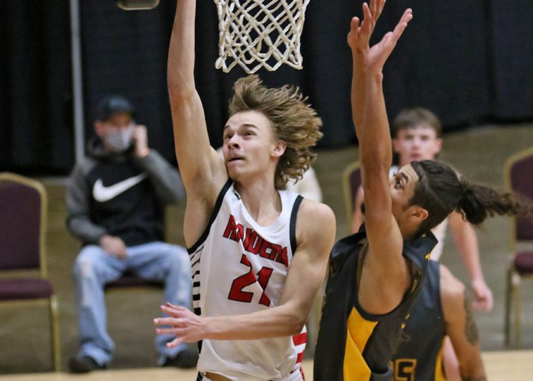 (Brad Davis/For LootPress) Liberty's Adam Drennen drives and scores against Mount View during New River Invitational action Wednesday night in Beckley.