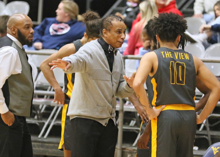 (Brad Davis/For LootPress) Mount View head coach Gary Brown coaches his team against Liberty during New River Invitational action Wednesday night in Beckley.