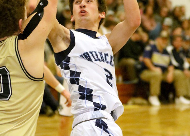 (Brad Davis/For LootPress) Meadow Bridge's Conner Mullins drives and scores against Greenbrier West January 21 in Meadow Bridge.