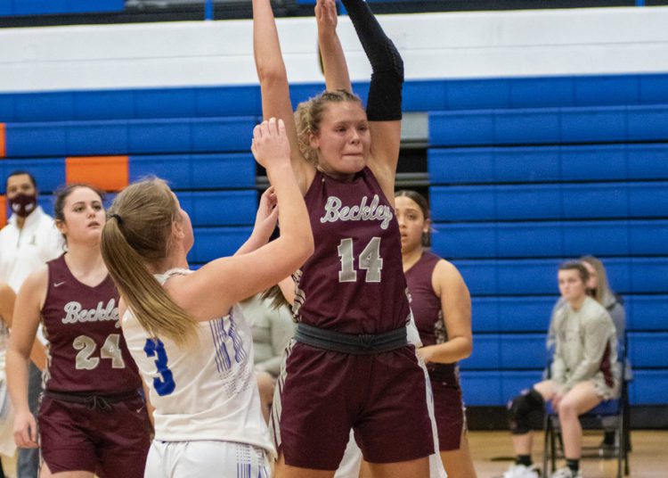 Beckley's Olivia Ziolkowski grabs a rebound in a game against Princeton on Jan. 27 (Heather Belcher/File Photo)