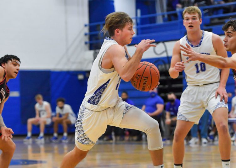 Princeton's Chase Hancock drives to basket during a game against Oak Hill last season 
(File Photo by Greg Barnett)