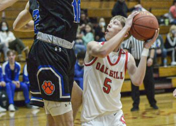 Princeton’s Grant Cochran,left, defends against Oak Hull’s Samuel Crist during Tuesday action in Oak Hill. F. Brian Ferguson/Lootpress