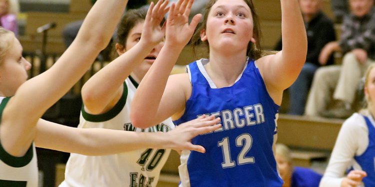 (Brad Davis/For LootPress) Mercer Christian's Bailee Martin drives to the basket against Wyoming East Thursday night in New Richmond.