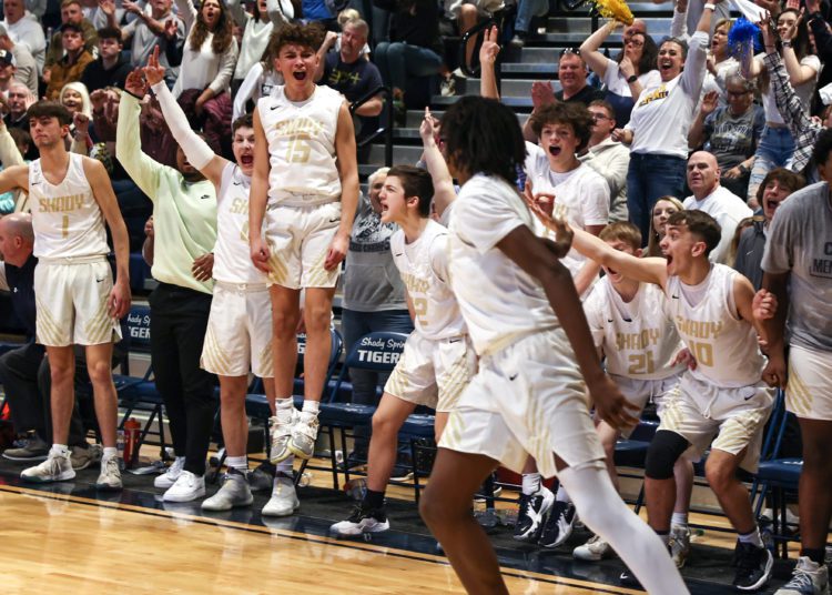 The Shady Spring bench erupts after Ammar Maxwell knocks down a corner 3 against Logan on Feb. 19 (File Photo by Karen Akers)