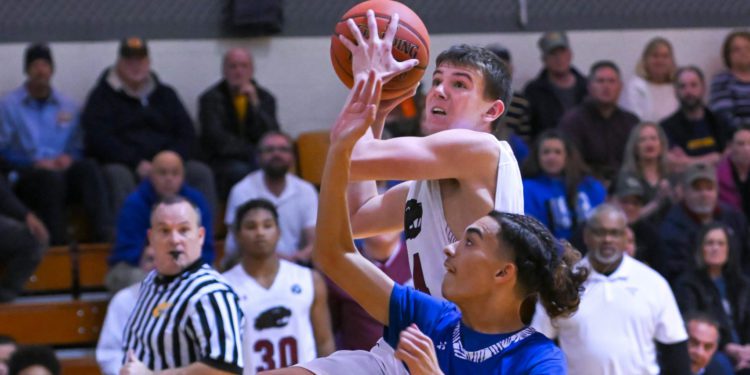 Bluefield's Caleb Fuller drives against Princeton on Feb. 10 (Greg Barnett/Lootpress)