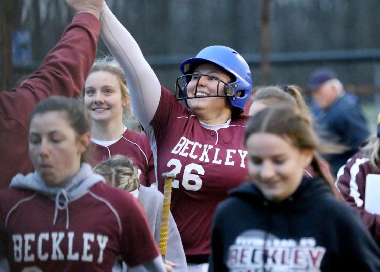 (Brad Davis/For LootPress) Beckley's Kayla Bird celebrates after a home run against Midland Trail on March 25.