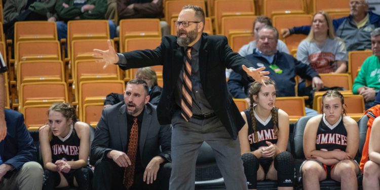 Summers County coach Chad Meador instructs his team during their Class AA quarterfinal game against St. Marys on March 9 at the Charleston Coliseum and Convention Center. (Photo by Heather Belcher)