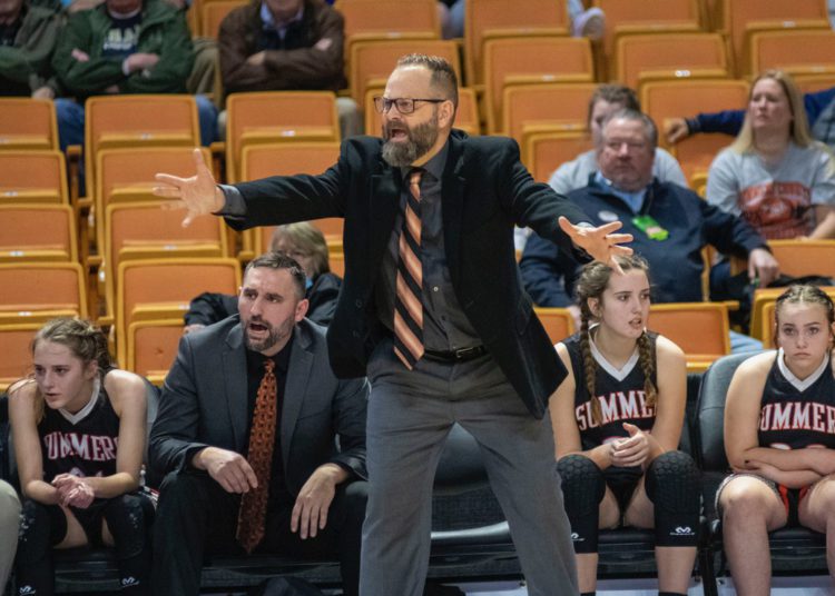 Summers County coach Chad Meador instructs his team during their Class AA quarterfinal game against St. Marys on March 9 at the Charleston Coliseum and Convention Center. (Photo by Heather Belcher)