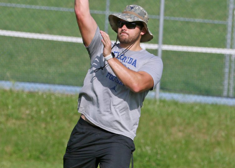 (Brad Davis/For LootPress) Westside head coach Justin Cogar throws to his receivers during practice June 15 in Clear Fork.