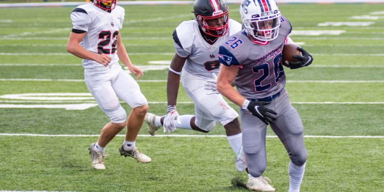 Independence running back Tyler Linkswiler runs into the end zone during a game against Oak Hill.
(File Photo by Heather Belcher)