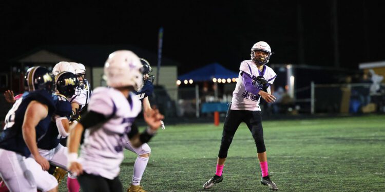 James Monroe's Eli Allen (13) throws a pass to during the first quarter of their football game against Nicholas County in Summersville on Oct. 29, 2021 (Photo by Chris Jackson)