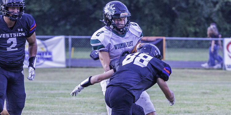 Wyoming East's Jackson Danielson takes off during a game against Westside in August. (File Photo by Tina Laney)