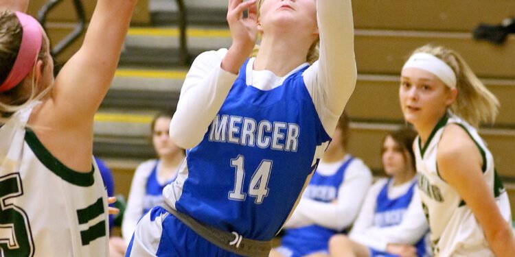 (Brad Davis/For LootPress) Mercer Christian's Kayley Trump drives to the basket against Wyoming East last season in New Richmond.