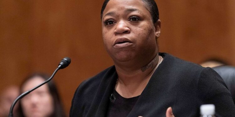 Briane Moore, formerly incarcerated in the Federal Bureau of Prisons, testifies during the hearing of Senate Homeland Security and Governmental Affairs Subcommittee on Investigations, on Sexual Abuse of Female Inmates in Federal Prisons, on Capitol Hill in Washington, Dec. 13, 2022.
Jose Luis Magana/AP