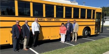 Cabell County Schools Superintendent Dr. Ryan Saxe with the GreenPower BEAST all-electric, purpose-built school bus. Joining him are Rhonda Smiley, President of the Cabell County Board of Education; Kim Cooper, Assistant Superintendent; Dan Gleason, Director of Transportation; GreenPower Vice President Mark Nestlen and GreenPower’s dealer representative Steve Ellis.