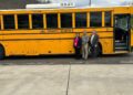 Lewis County Schools taking delivery of a GreenPower BEAST all-electric, purpose-built school bus. In the photo are Dr. Robin Lewis, Superintendent; Gerald Paugh, Transportation Supervisor; and GreenPower Motor Vice President Mark Nestlen.