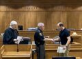 Returning Raleigh County Sheriff's Office employee Stephen Frey is sworn in before Circuit Court Judge Kirkpatrick and Sheriff Canaday