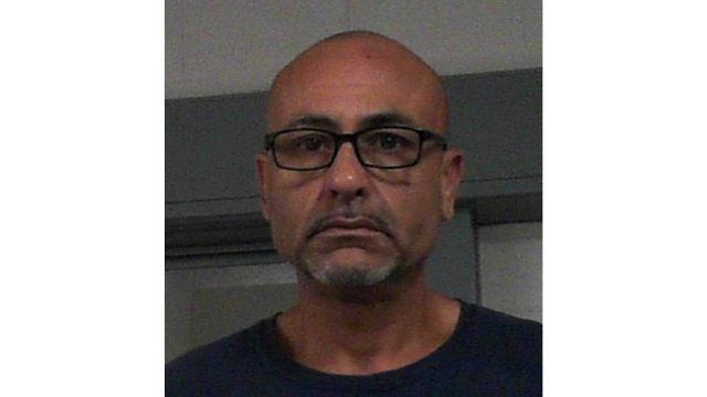 Man arrested after slapping woman and laughing