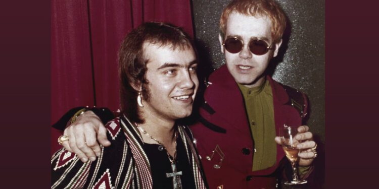 British pop idol Elton John appears with his lyricist Bernie Taupin in London on March 5, 1973. Taupin's memoir, "Scattershot: Life, Music, Elton, and Me" releases this week. (AP Photo/John Glanvill, File)