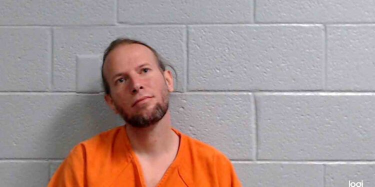 Man arrested after yelling at customers at CVS in Fayetteville