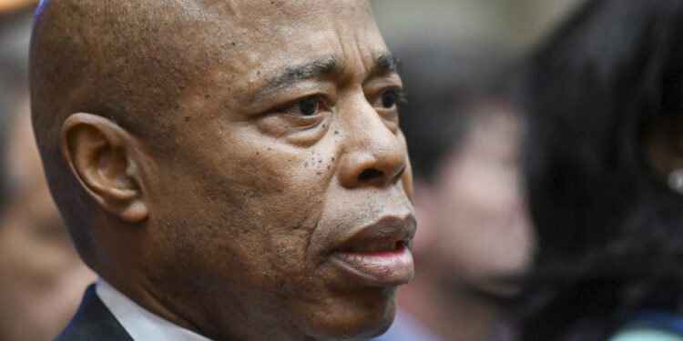 FILE - New York City Mayor Eric Adams listens at the state Capitol, Jan. 10, 2023, in Albany, N.Y. Mayor Adams has been accused of sexually assaulting a woman in 1993, according to a legal summons filed Wednesday, Nov. 22, 2023. The three-page filing does not contain details of the alleged assault but names Adams, the transit bureau of the New York Police Department and the New York Police Department Guardians Association as defendants. (AP Photo/Hans Pennink, File)