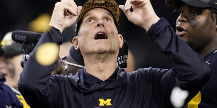 Michigan head coach Jim Harbaugh celebrates after their win against Washington in the national championship NCAA College Football Playoff game Monday, Jan. 8, 2024, in Houston. (AP Photo/Godofredo A. Vasquez)