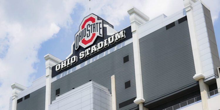 FILE - Clouds pass above The Ohio State University's football stadium, May 18, 2019, in Columbus, Ohio. A woman who fell from the stands to her death during a graduation ceremony at Ohio State University last weekend has been identified as a Georgia resident, authorities announced Tuesday, May 7, 2024. (AP Photo/John Minchillo, file)