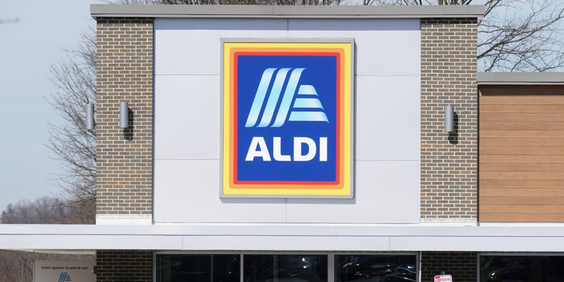 FILE - Customers walk into an Aldi supermarket in Bensalem, Pa., March 14, 2022. Discount grocer Aldi plans to add 800 stores across the U.S. in a five-year expansion plan as it looks to capitalize on cost-conscious Americans feeling the pinch at grocery stores. (AP Photo/Matt Rourke, File)