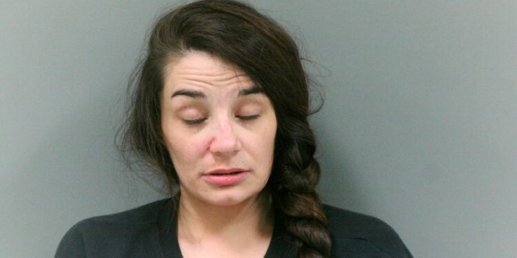 A woman is facing charges after she stole a man's key, started smacking his vehicle, yelling and howling like a dog, and calling the police a dog pig.