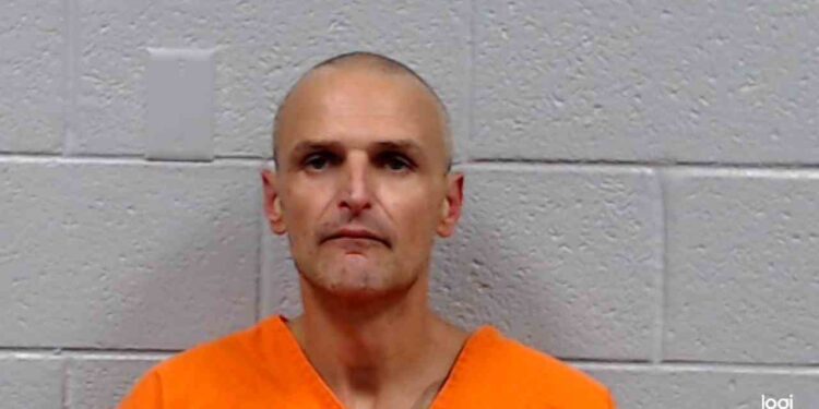 Man arrested after being outside naked, touching himself