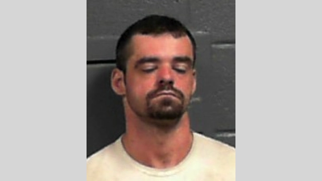 A man faces charges after striking his girlfriend, threatening to kill her in front of his son.
