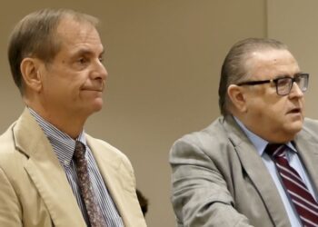 Tom Truman and Matthew Victor look on during Tuesday's pre-trial hearing