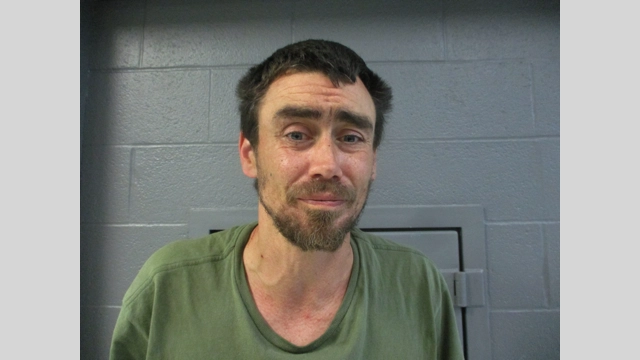 Man assaults woman with baseball bat