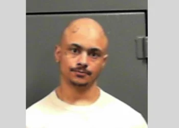 Couple arrested after a fight broke out because her leg was on his while sleeping