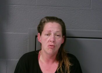 Mother strikes son in the back of the head with a vacuum cleaner