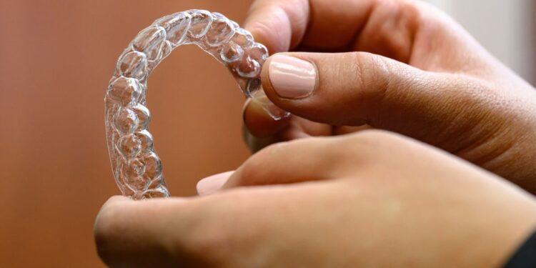 Photographs of Dr. Madison Smith, Orthodontics Resident and Khaled Alsharif, Program Director and Assistant Professor, Department of Orthodontics on Wednesday, May 28th, 2025 at Suncrest Town Center, in Morgantown, W.Va. (WVU Photo/Davidson Chan)