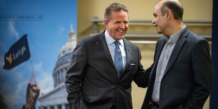 Incoming WVU President Mike Benson, deans and vice presidents hold a call campaign to high school students who have yet to decide coming to WVU in the Shenandoah Room of the Mountainlair, April 2nd, 2025.  (WVU Photo/Brian Persinger)