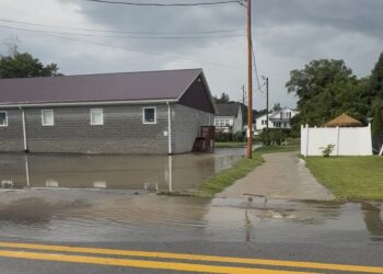 High water along Oyler Avenue in Oak Hill Sunday evening.