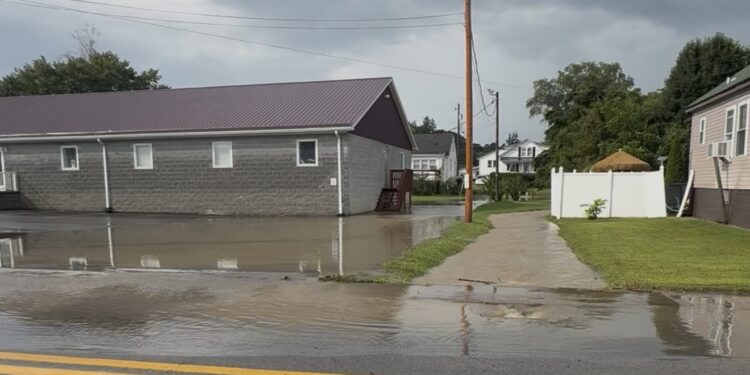 High water along Oyler Avenue in Oak Hill Sunday evening.